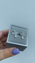 Load and play video in Gallery viewer, Silver kissing cross Iconic stud earrings
