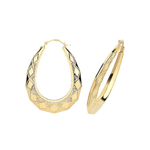 Oval engraved hoop earring yellow gold