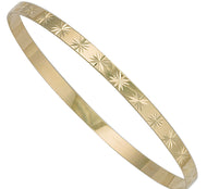 Woman’s Star pattern diamond cut yellow gold Gypsy bangle